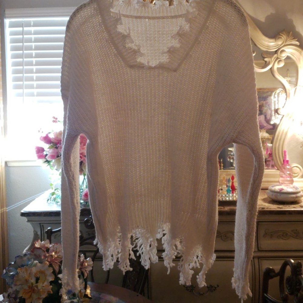 Really cool cream colored sweater brand new withou